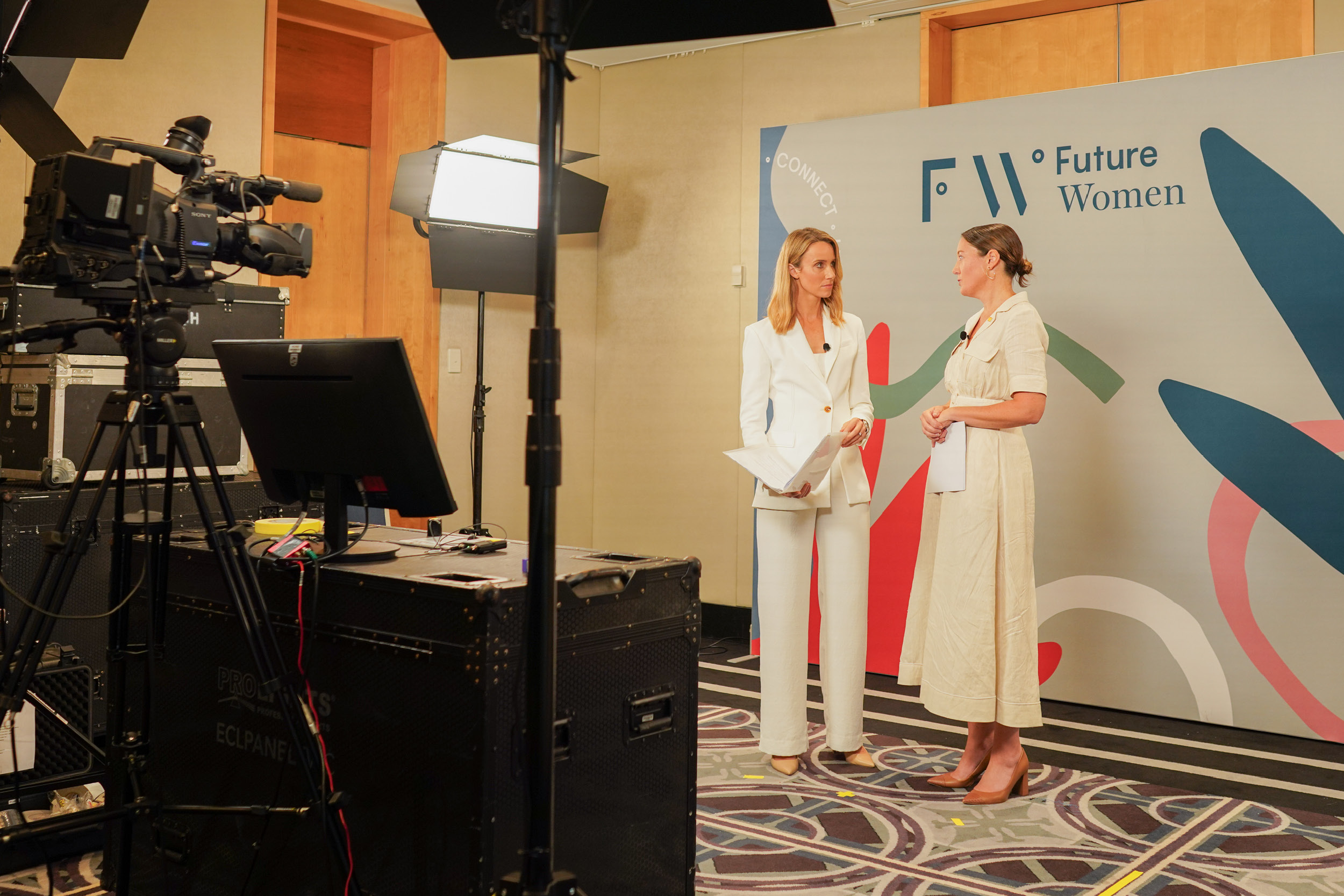 McMillan addressing thousands on the virtual stream of the FW Leadership Summit with host Alice Monfries